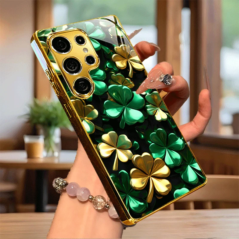 

Gold-plated tempered glass phone case, compatible Galaxy S26 S25 S24 S23 S22 Ultra Plus. Gold green four-leaf clover design.