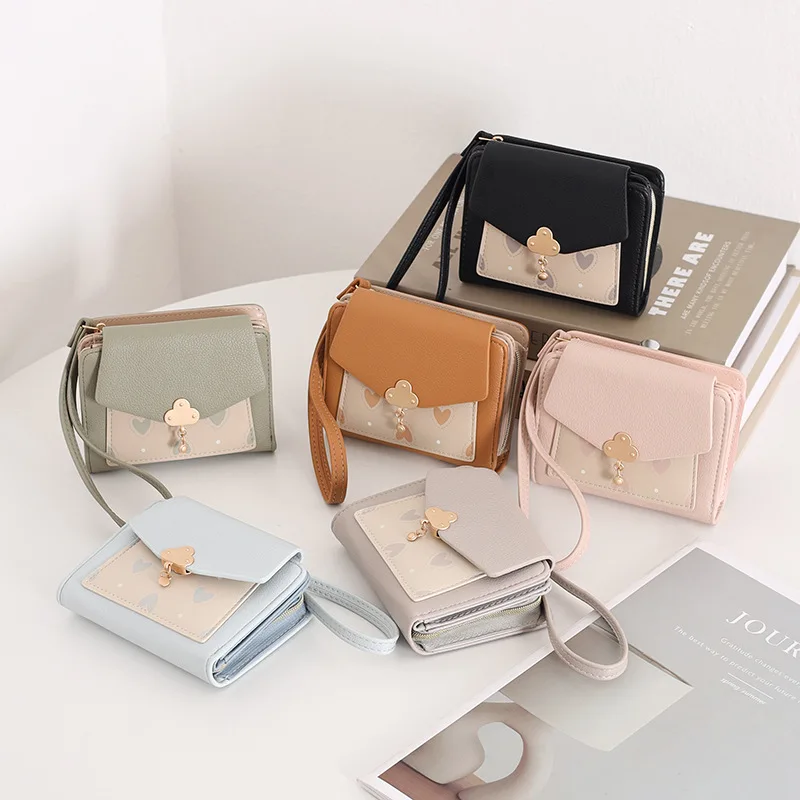 

PU leather ladies' short wallet, printed zipper, hardware pendant, hand-held student coin portable coin purse