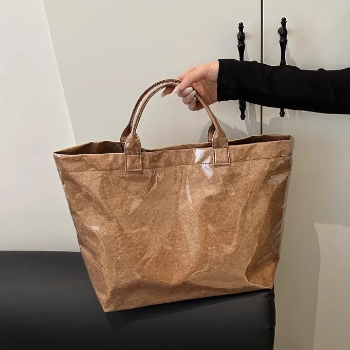 

Large Capacity Summer Jelly Tote Bag Women's Versatile 2025 New Single Shoulder Handheld Shopping Bag Commuting Tote Bag