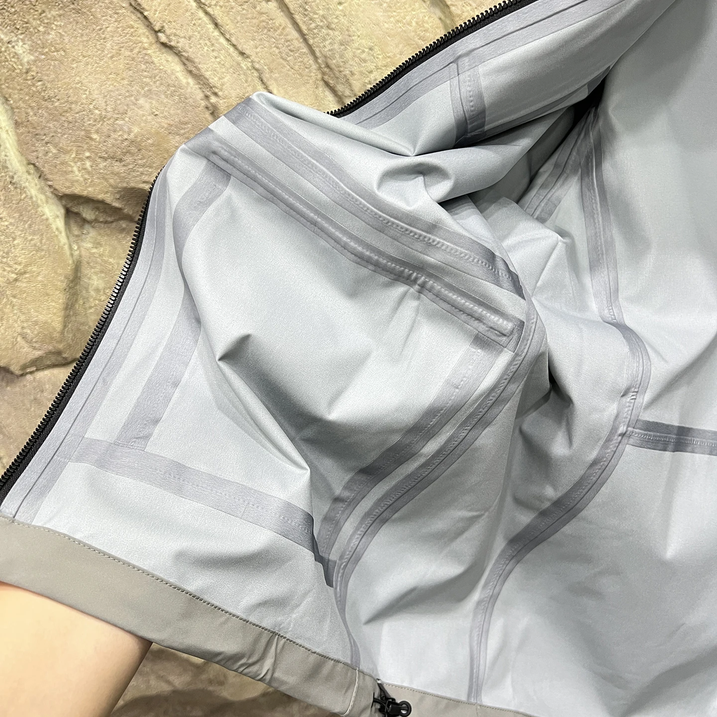 Sl High-End masculino ao ar livre à prova de vento impermeável com capuz Jaet fibra de poliéster longo Sve solto ajuste Sle para o outono