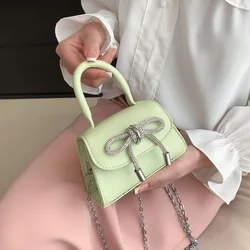 Mini bolso de hombro con diseño de lazo para mujer, bandolera femenina con solapa de cuero PU, con cadena, a la moda, 2024