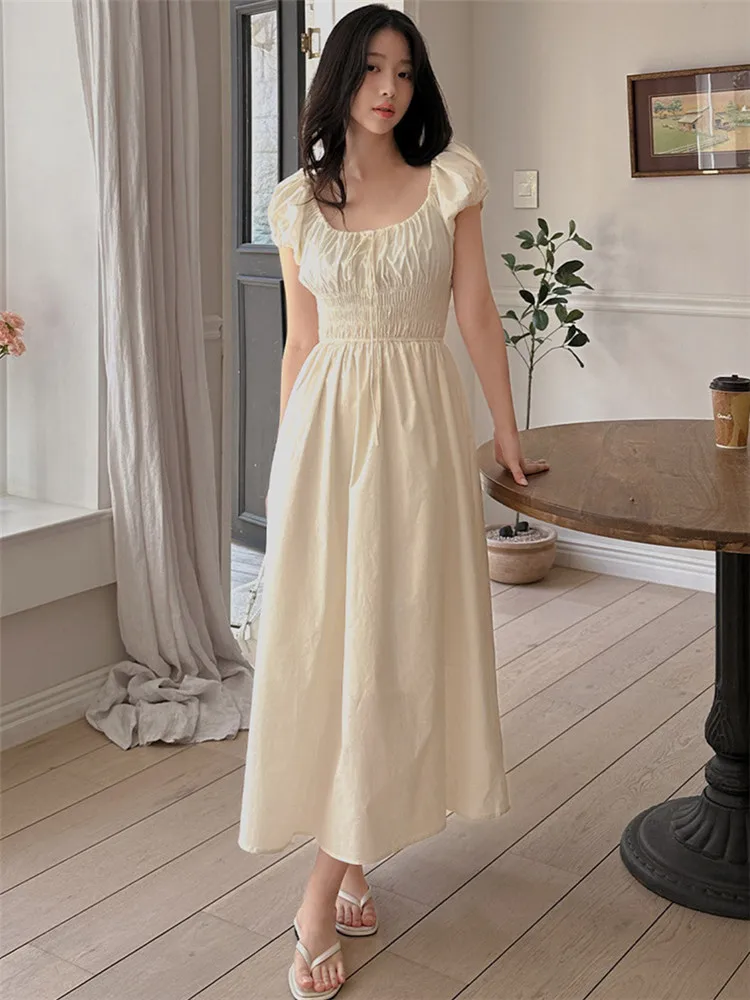 فستان صيفي على الطراز الكوري برقبة على شكل حرف U تنورة نسائية طويلة على شكل حرف a تنورة طويلة للتخسيس وأكمام فقاعية وخصر مربو...