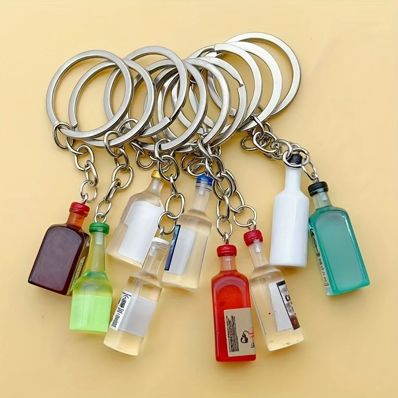 9 porte-clés en résine en forme de bouteille de bière - Mini porte-clés rond coloré, idéal pour les cadeaux fantaisie pour femmes lors de fêtes