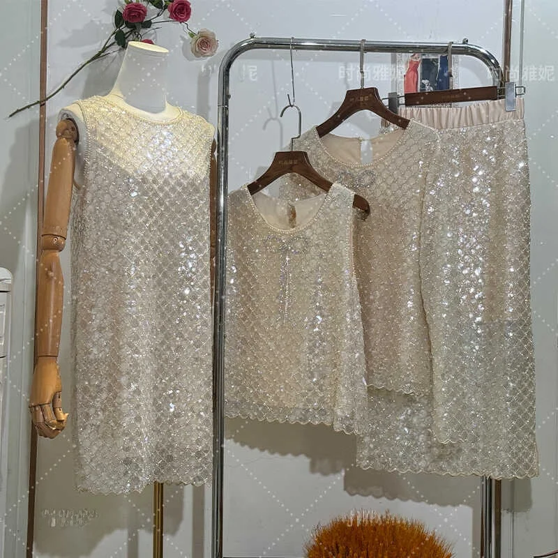 

Slimming round Ne Pearl Embellied Dr Faionable Yanie Long Sve Skirt Vest Top Sweet Sle Regular Length