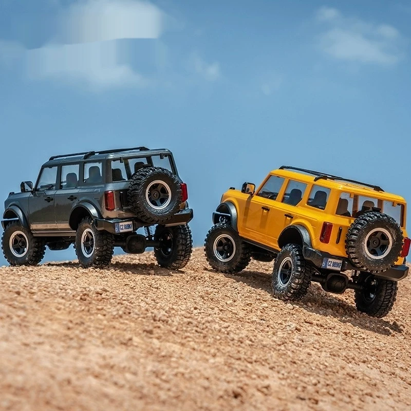 جديد بيع جيد Fms 1/18 برونكس الذهب الاندفاع الكهربائية التحكم عن بعد أربع عجلات القيادة تسلق مركبة Rc على الطرق الوعرة سطح المكتب لعبة نموذج