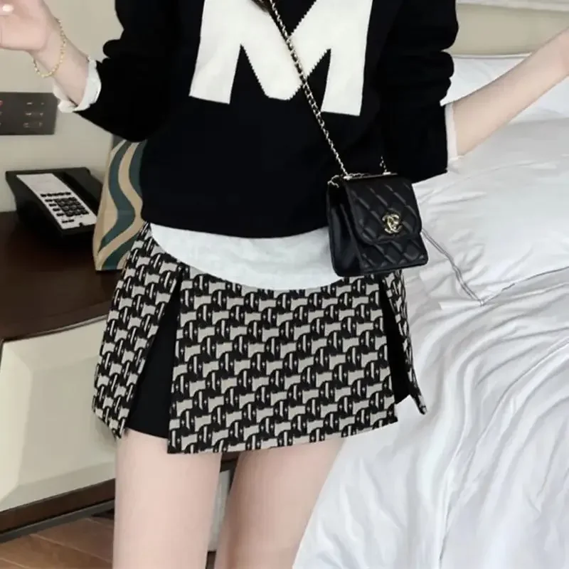 تنانير نسائية عالية الخصر ضيقة على شكل حرف a ذات ثنيات تنانير مكتب سيدة Jupe Mujer Faldas K610 ربيع جديد موضة الجاكار تنورة قصيرة