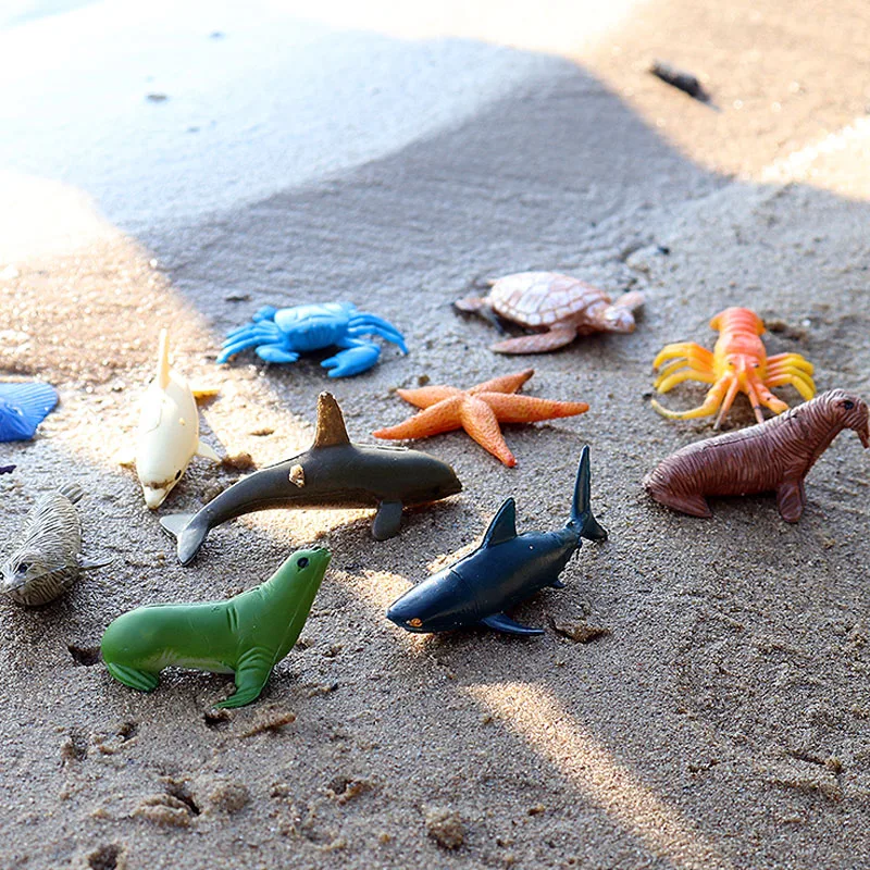 Oenux Sea Life Animali Set Megalodon Delfino Raggi Pesce tropicale Balena Squalo Modello Action Figures Educazione in miniatura Giocattoli per bambini