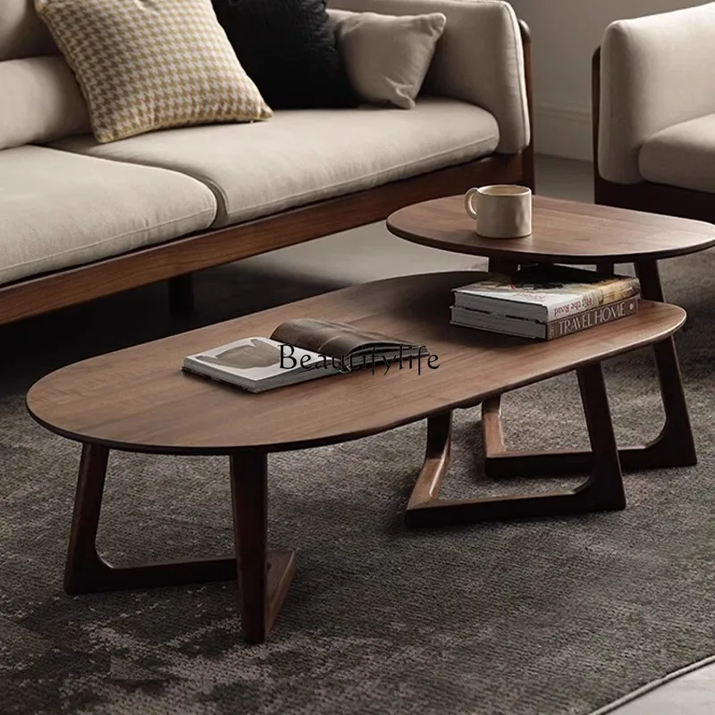 

Homestay designer solid wood coffee table office very simple modern high-end light luxury black walnut wooden table small