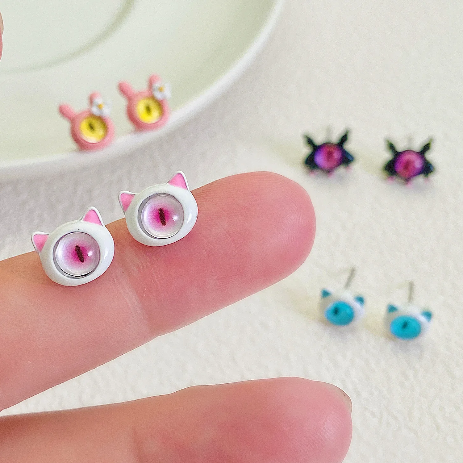 New Silver Needle Cartoon Cute Little Monster Cat Eye Stone Earrings Niche Design Sense Of Childish New Wave Earrings