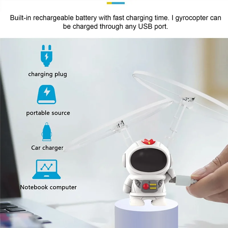 A07I UFO رائد فضاء لفتة الاستشعار تحلق روبوت رائد الفضاء مركبة فضائية هليكوبتر التحكم عن بعد طائرة Led للأطفال