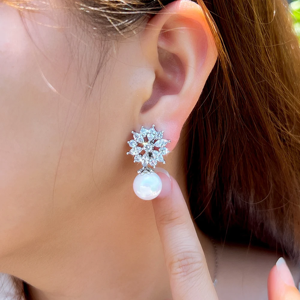 CWWZircons Elegant Cubic Zirconia Flower Pearl No Hole Earrings for Women Fashion Jewelry Ear Clip On Non Pierced Earring EJ0006