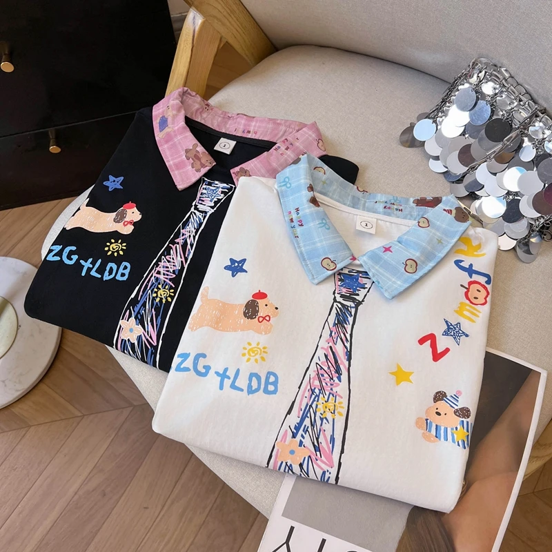 2025 صيف جديد متعدد الاستخدامات نمط Preppy المتخصصة الكرتون الكتابة على الجدران المتخصصة اقتصاص التلبيب فضفاضة قصيرة الأكمام شيك Ins تي شيرت #5