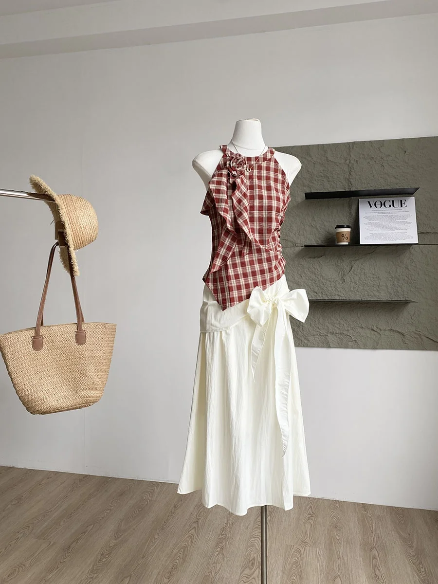 

Летний новый модный комплект 2025: винтажная юбка в корейском стиле и топ с асимметричным узором, нежный и элегантный образ