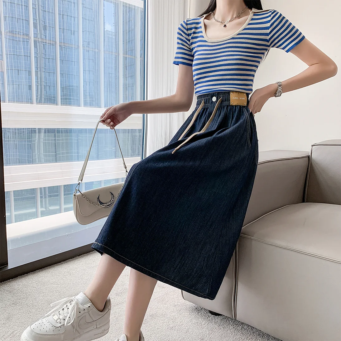 

Весна 2026: Новая джинсовая юбка миди с эластичным поясом, больших размеров, для женщин, стройнящая, омолаживающая, скрывающая недостатки фигуры, средней длины