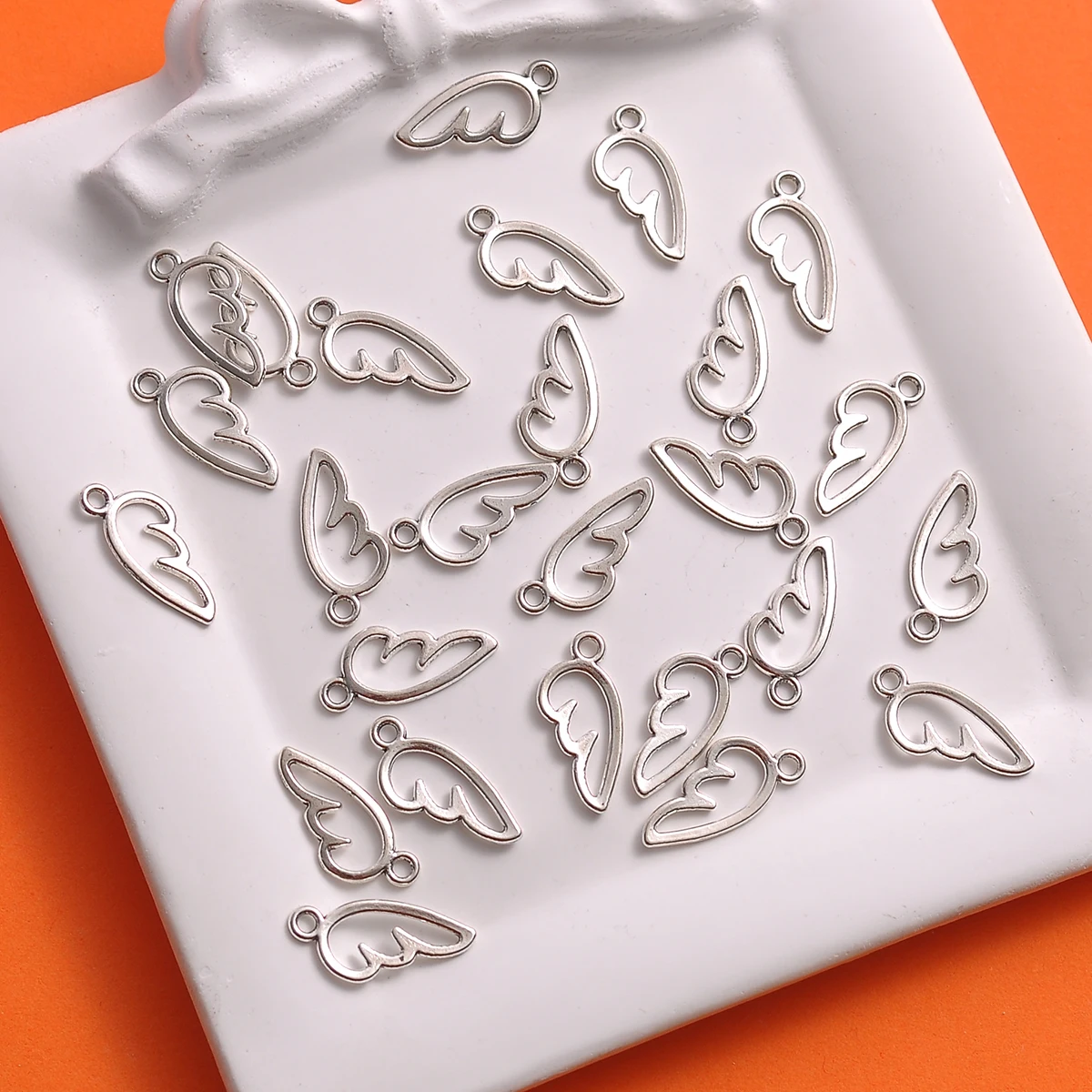 60 Pieces of Hollow Single-Wing Shaped Pendants, Simple Hollow Feather Wing Charms, Suitable for DIY Bracelets, Necklaces, and Earrings, Fairy-Style Handmade Beaded Jewelry Accessories