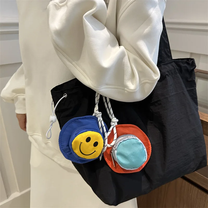 

2024 New Headphone Bag Printed Mini Bag Pendant Portable Storage Bag Coin Key Bag Printed LOGO Change Cosmetic Bagstyleexquisite