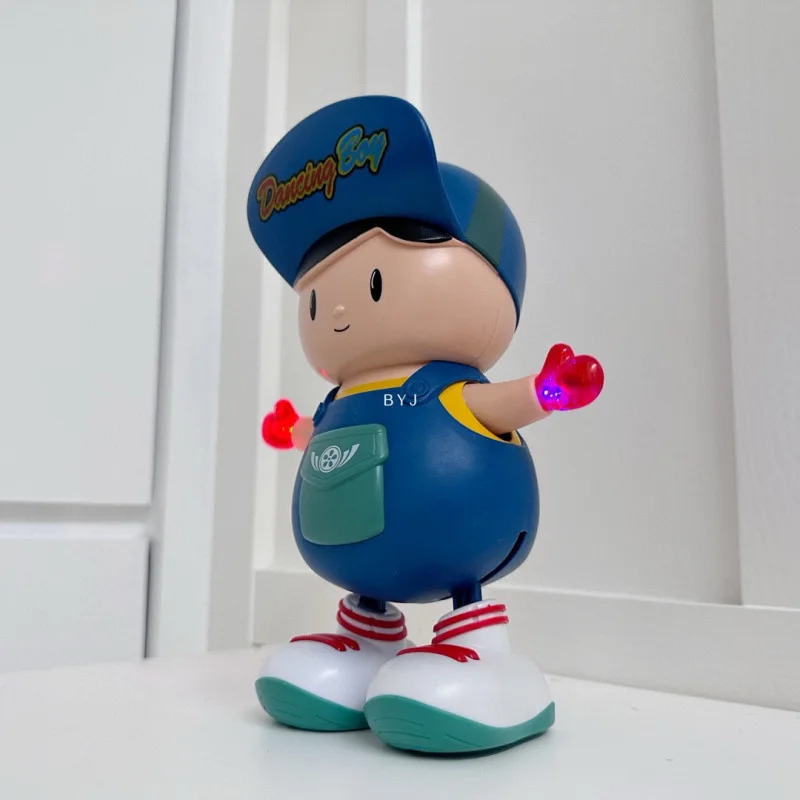 Figurka Tańczącego Chłopca, Zabawka Interaktywna, Niebieskie Ogrodniczki 16cm, Prezent Urodzinowy dla Dzieci