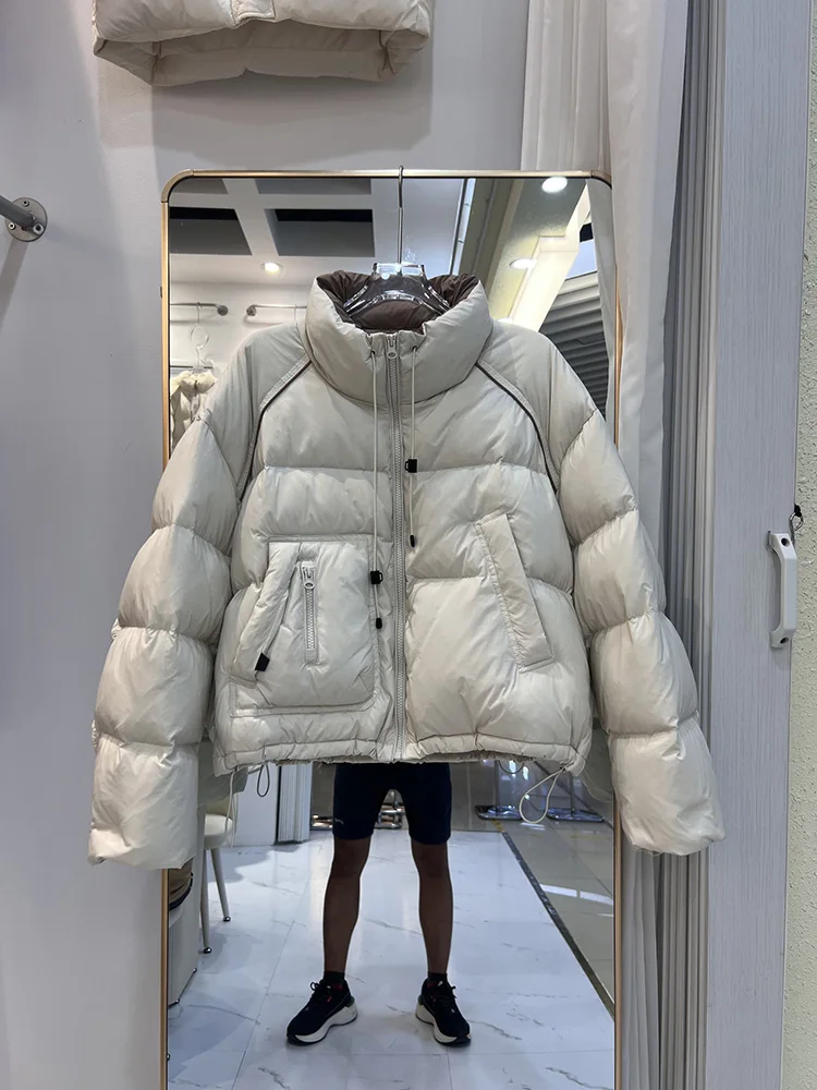 سترة شتوية جديدة بسيطة للنساء بنمط قصير النسخة الكورية بياقة واقفة ورباط غير متماثل معطف أسفل البط