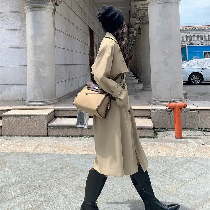 This is a new youthful versatile comfortable and skin-friendly khaki trench coat for casual wear