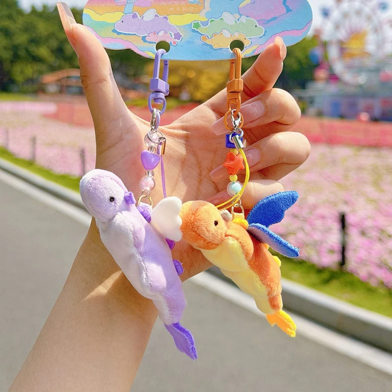 

Cute Mini Flying Dragon Plush Keychain 12 Colors Beaded Dinosaur Bag Charm for Backpack, Key and Birthday Gifts.