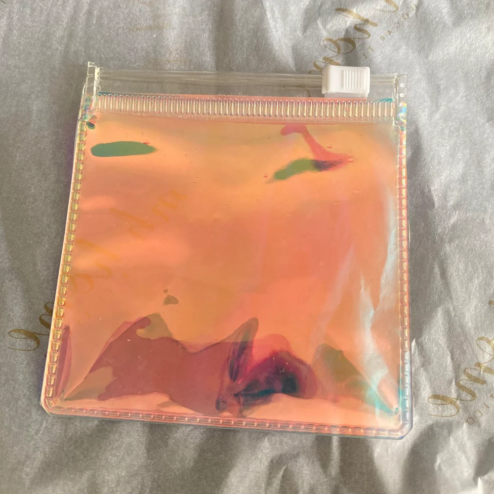 

100pcs Promotional Holographic Iridescent Jewelry bag Custom Color Fashion Laser Transparent Zipper Pvc Bag