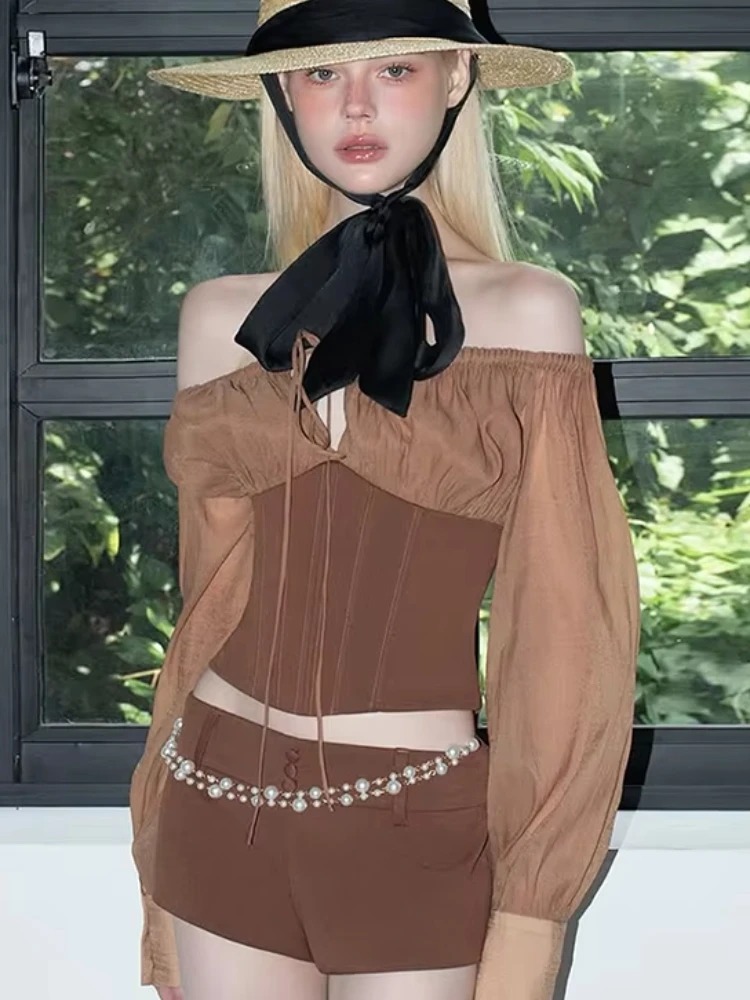 

Macheda Chic Elastic Slash Neck T-Shirt Women Sexy Patchwork Bandages Hollow Button Full Sleeve Street Club Skinny Crop Tops
