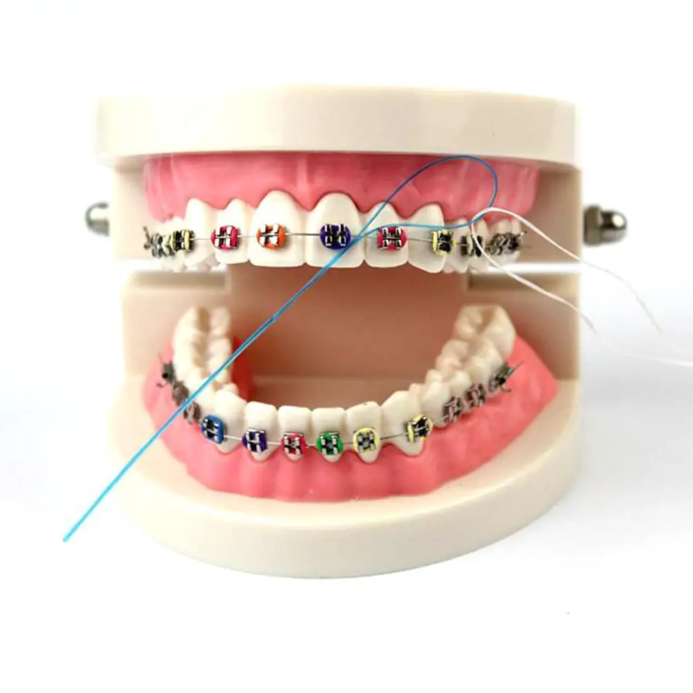 Enfileur de fil dentaire, support de fil dentaire entre les bretelles orthodontiques, bretelles de traction de pont