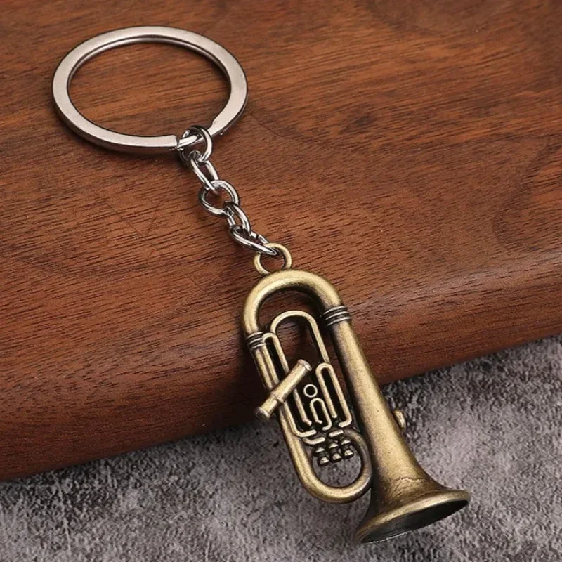 Creative Mini Saxophone Keychain Music Lover Gift Personalized Mini Metal Keyring Pendant for Car Accessories Small Musical Toys