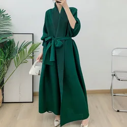 Long trench coat for women with color matching bat sleeves, loose and oversized pleated outer robe