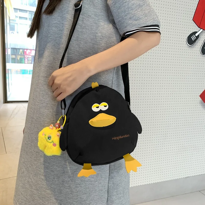 ​ حقيبة ظهر صغيرة من Duck لعام 2025 للفتيات - حقيبة كروس قابلة للتعديل مقاومة للماء، حقيبة كتب نباتية لطيفة ومدرسة غريبة الأطوار أنيقة للأعمار من 12 إلى 16 عامًا ​