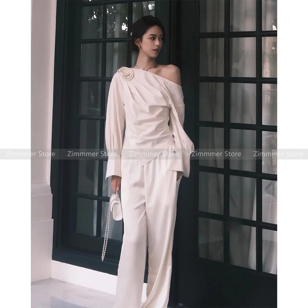 

Niche new senior sense of three-dimensional rose long-sleeved shirt + high-waisted casual loose trousers set female