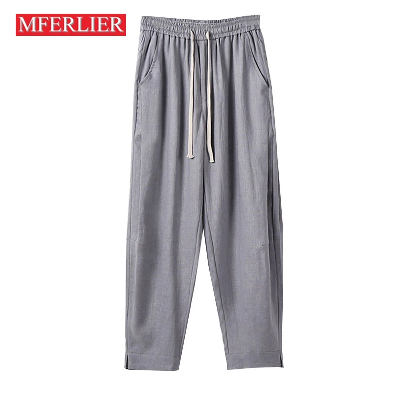 Wiosenne letnie spodnie w dużych rozmiarach męskie 5XL 6XL 7XL 8XL talia 140cm bawełniane lniane luźne spodnie
