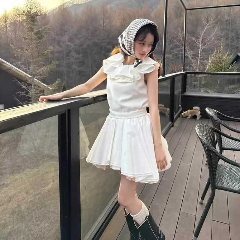 النمط الياباني الحلو الأبيض تنورة قصيرة ربيع الخريف 2025 المرأة مرونة الخصر غير النظامية منتفخ تنورة الفتيات اليومية تنورة غير رسمية #6