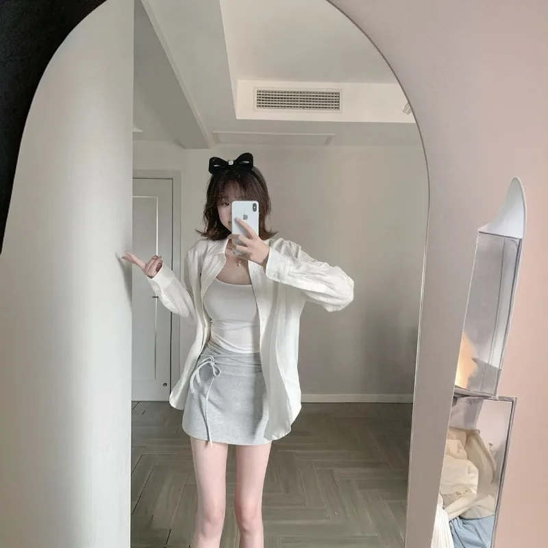 夏の新痩身 A ラインシンプルなヒップハグ女性のスカート和風ストラップデザイン弾性ウエスト白ショートスカート