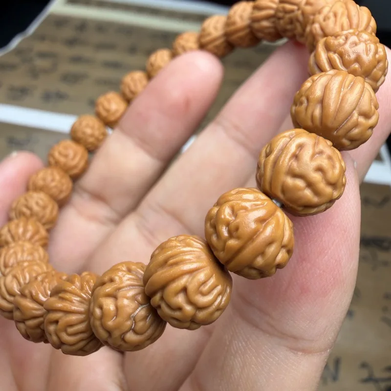 All items: carving, brain pattern pit monkey head walnut bracelet, Beijing-style eight-sided peach single