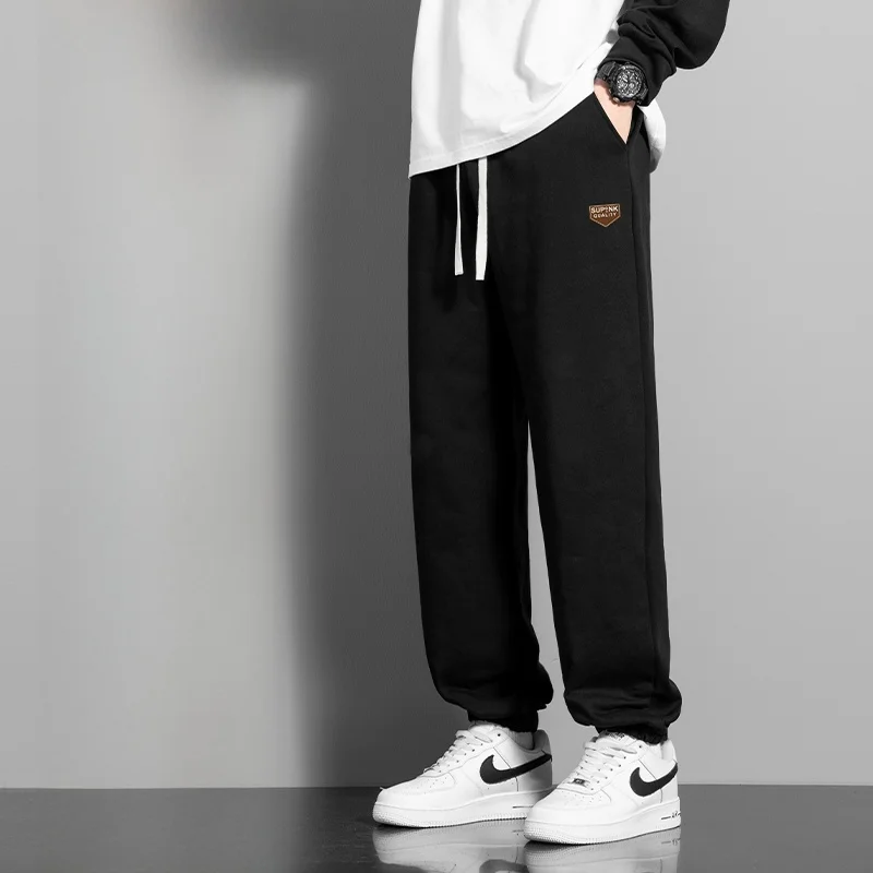 

Модные повседневные спортивные брюки для мужчин, весенняя коллекция, свободные, с манжетами, стильные, универсальные, с эластичной талией, городской стиль