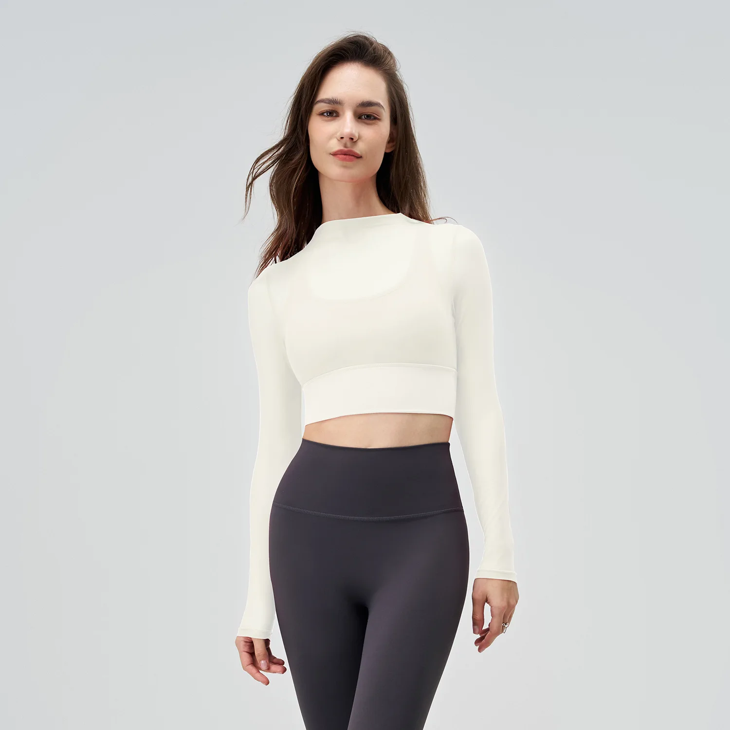 Camicie sportive a maniche lunghe in Mesh ad asciugatura rapida traspirante donna palestra Yoga Fitness Slim elastico morbido Crop Top delicato sulla pelle