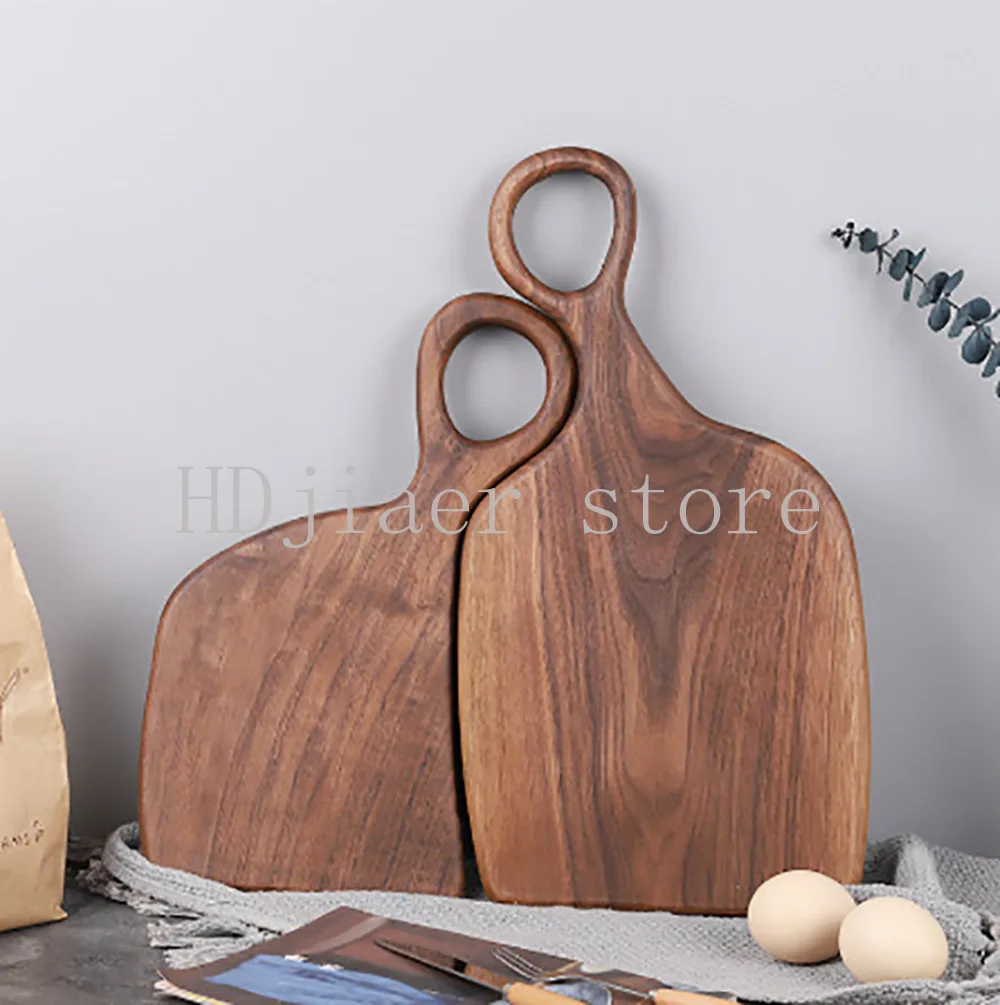 

Walnut couple cutting boards, made of solid wood, are super lovely for cutting steaks and bread.