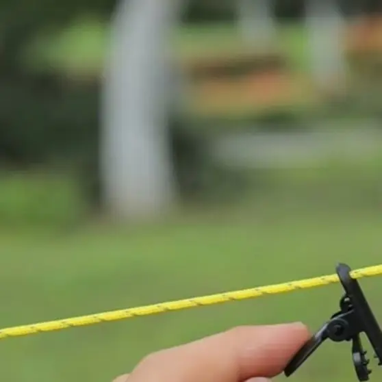 Portable Adjustable Clothesline 10M With 20 Clips Reflective Rope High Strength Load Bearing Compact For Travel Camping Hiking