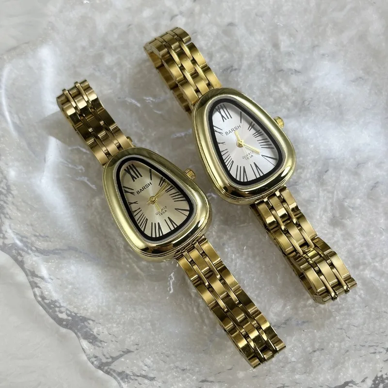 العلامة التجارية الشهيرة النساء غير النظامية الأفعى رئيس الهاتفي ساعة كوارتز فاخرة الفولاذ المقاوم للصدأ حزام ساعة اليد هدية Montre فام دروبشيبينغ