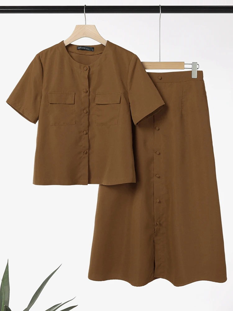 

ZANZEA Женские элегантные комплекты из 2 предметов, модные однотонные юбки с эластичной резинкой на талии, рубашки с короткими рукавами и круглым вырезом, комплекты юбок миди, комплекты из 2 предметов