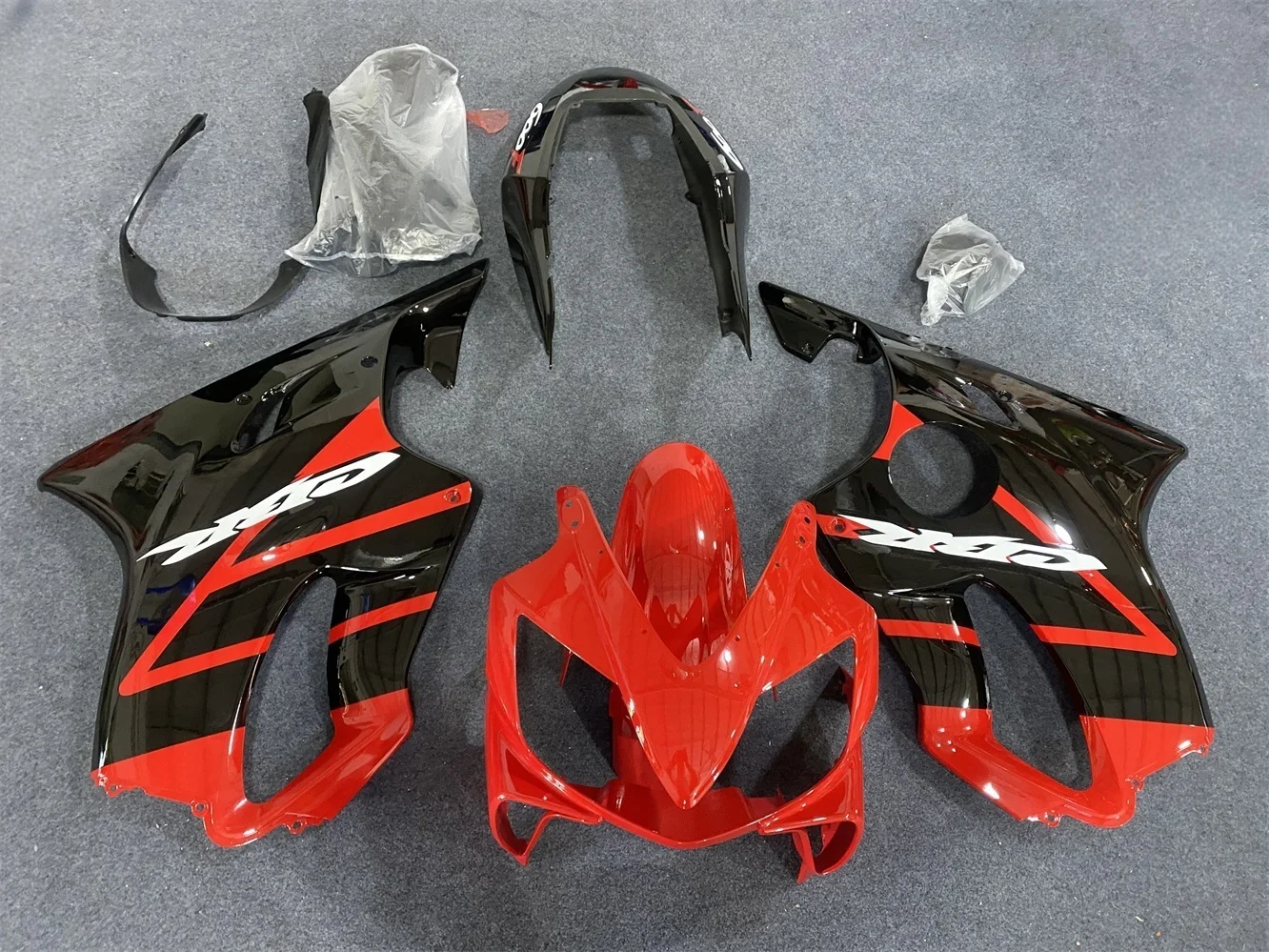 The motorcycle fairing is suitable for the CBR600F 2004 2005 2006 2007 CBR600 F4I 04 05 06 07 body fairing with red and black