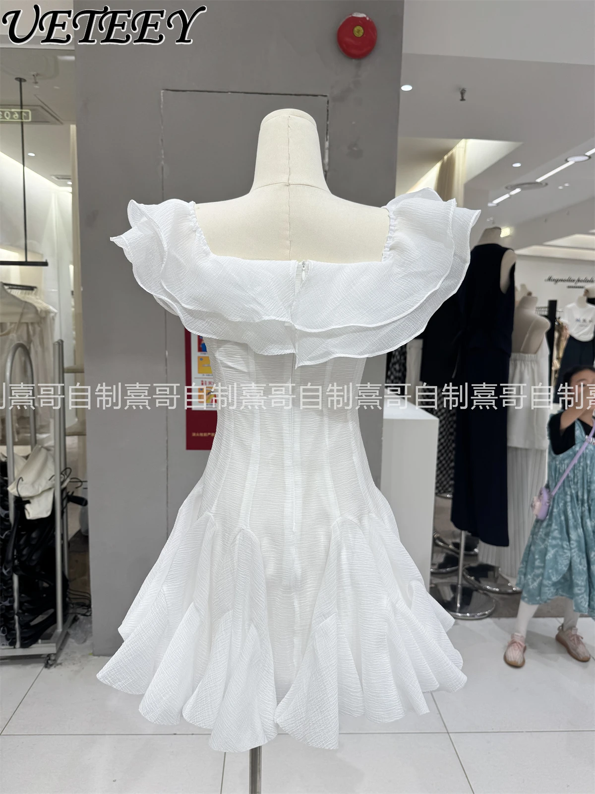 Temperamento francês vento suave gola quadrada cor sólida vestido de manga voadora verão novo high-end único lindo bud vestidos