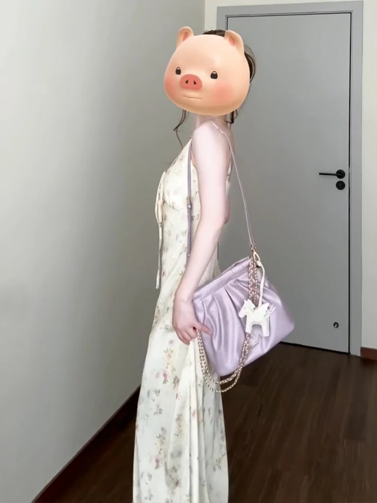 กระโปรงยาวลายดอกไม้สไตล์เกาหลีสำหรับผู้หญิง รุ่นใหม่ประจำฤดูร้อนปี 2025 เอวสูง ใส่สบาย นุ่ม เบาสบาย เหมาะสำหรับใส่ไปเที่ยวทะเล