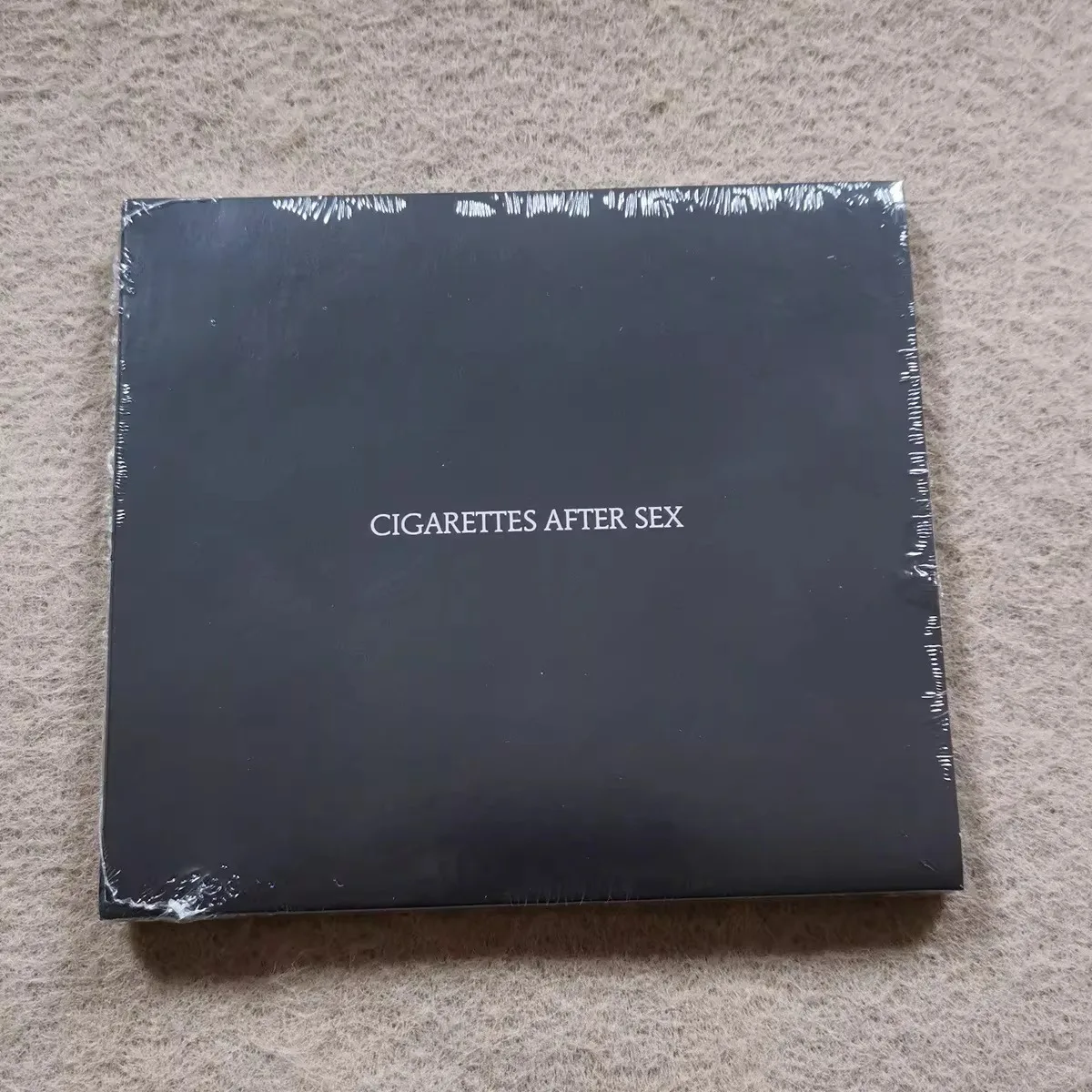 Cigarettes After Sex, álbum de nombre propio, Dream Pop, música indie pop, CD, estilo vocal poético simple e inolvidable