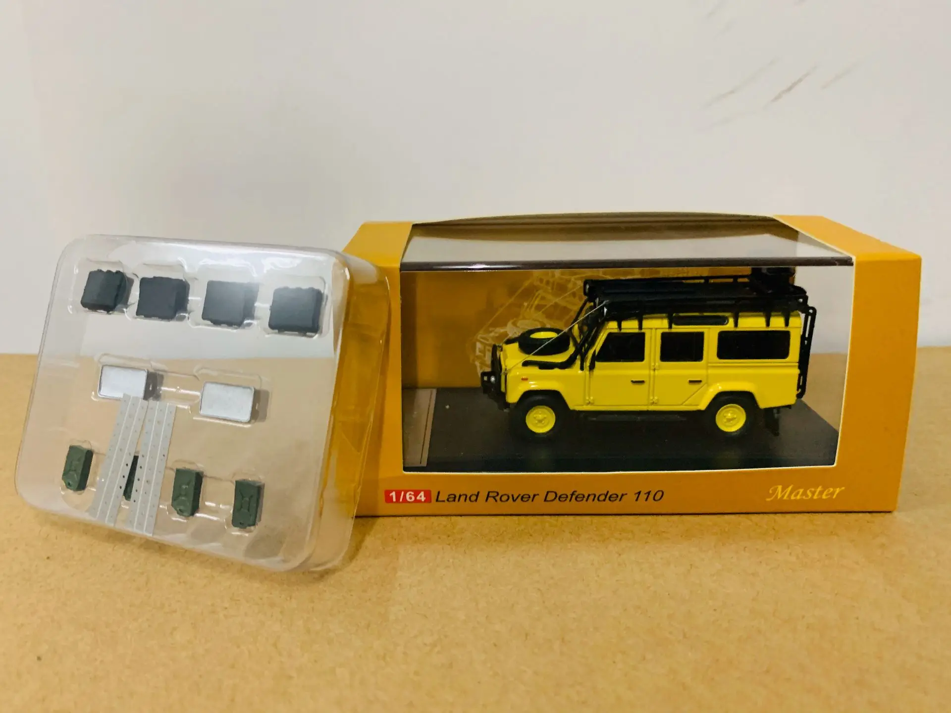 

Master Defender 110 Yellow 1/64 Scale DieCast Model New in Box