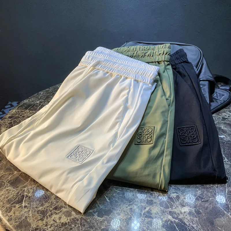 

Light luxury ice silk pants for men's summer new fashion trend brand high-end embroidery sports quick drying casual pants