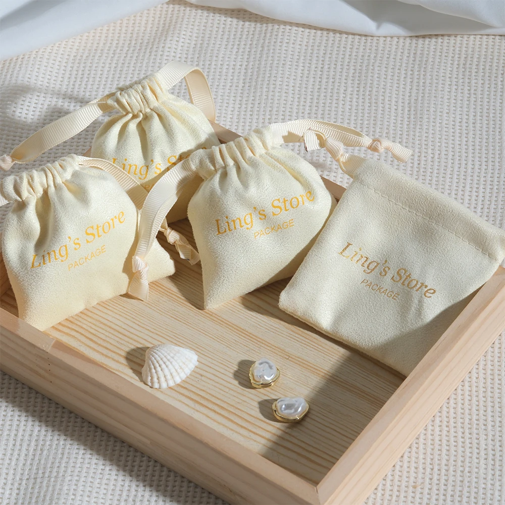 

100Pcs Custom Logo Jewelry Drawstring Flannel Bag Velvet Packaging Pouch Chic Wedding Favors Velvet Suede Cosmetic Candy Pockets