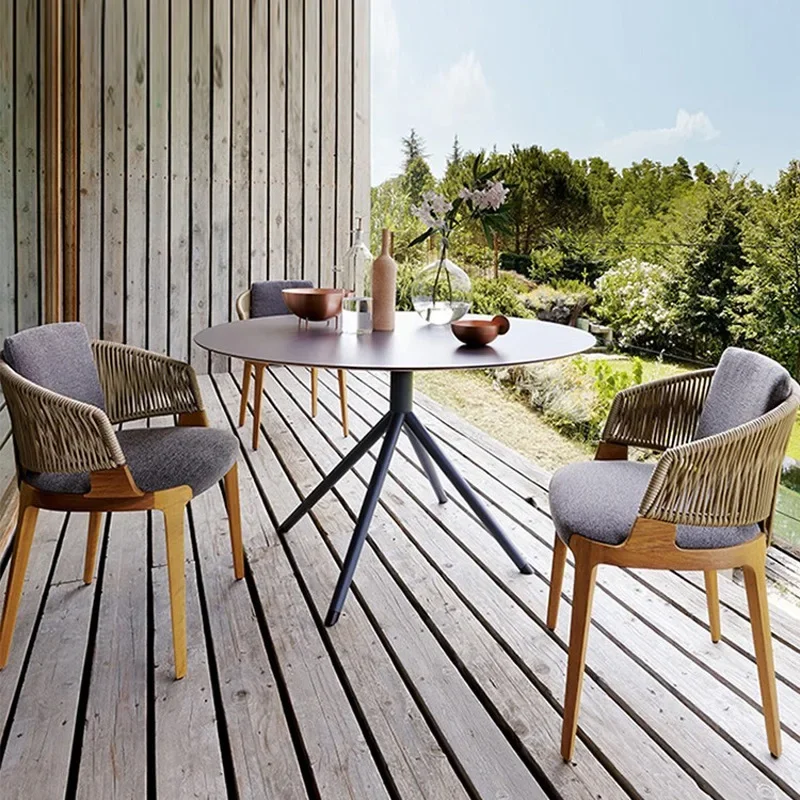 

Outdoor teak table and chair courtyard rattan chair balcony solid wood rattan combination