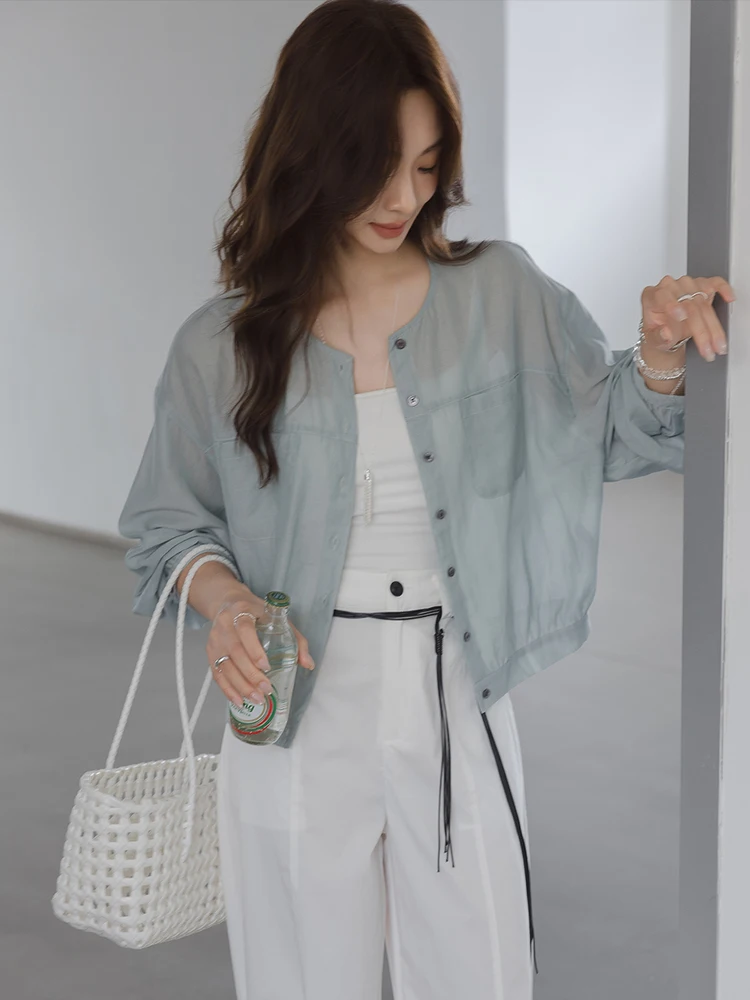 

Sun Protection Ladies irt round Ne ort Thin Faionable Women's Top Breathable Lyocell Material Long Sve Loose Fit